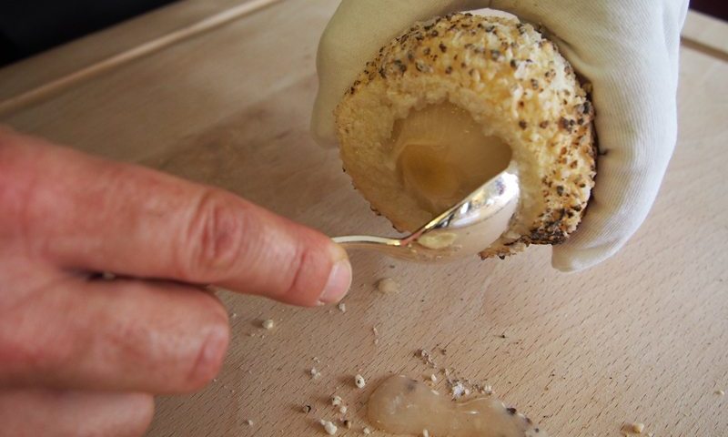 remove the onion from inside the salt crust with a spoon